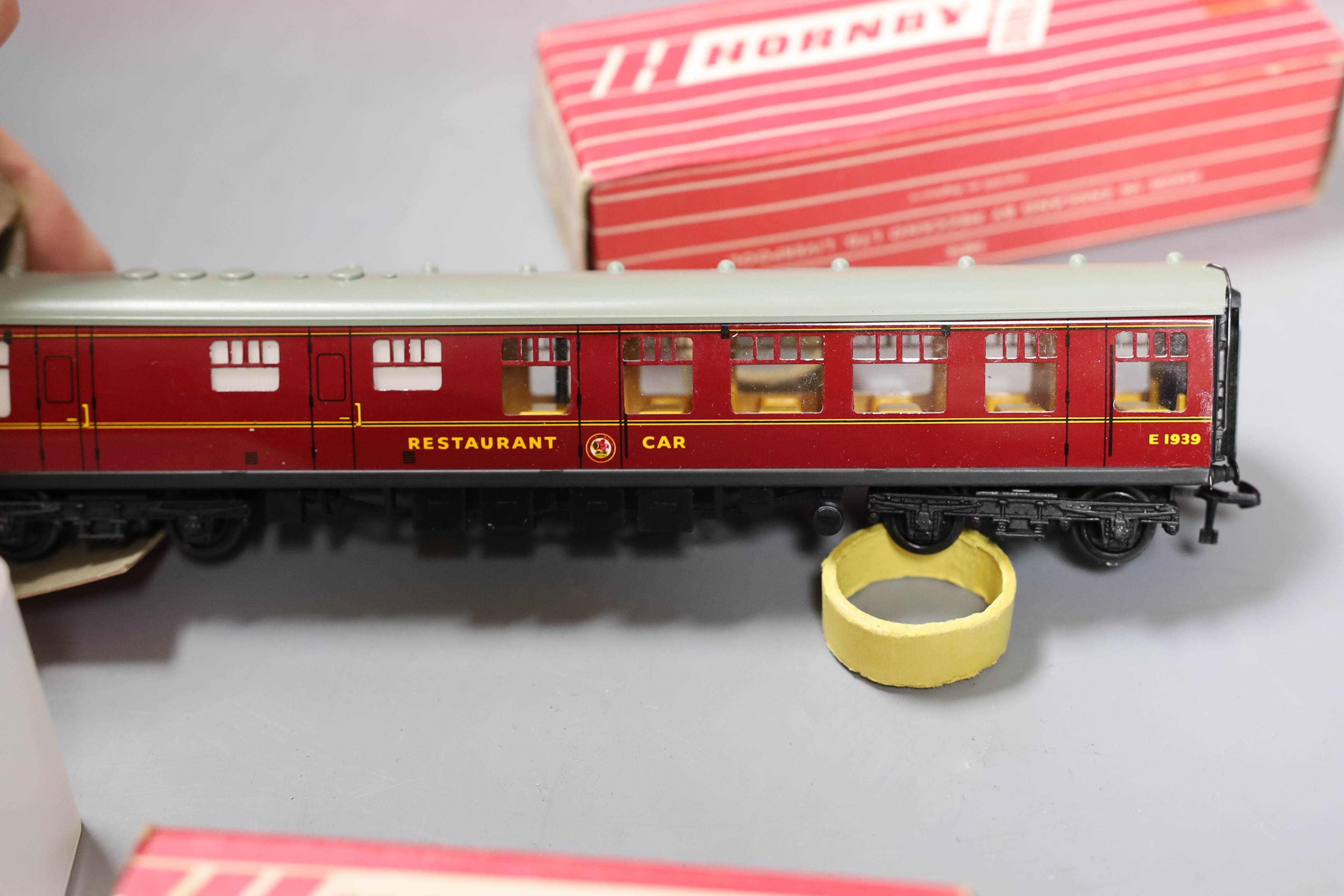 Rare boxed Hornby Dublo - 2245 3300 HP electric locomotive, 4070 and 4071 Restaurant Car, 4076 six wheeled passenger brake van and three empty Hornby boxes